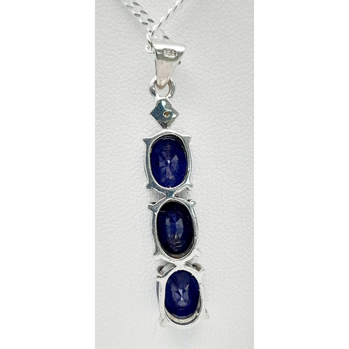 648 - A Sterling Silver Three Blue Sapphire and Diamond Set Pendant Necklace. 46cm Length. The Pendant Mea... 