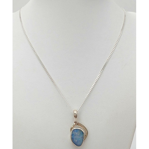 669 - A Sterling Silver Opal Set, Modernist Design, Pendant Necklace. 46cm Length, Pendant Measures 3cm Dr... 