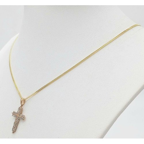 695 - A Yellow Gold Gilt Sterling Silver Diamond Set Cross Pendant Necklace. 46cm Length. Pendant Measures... 