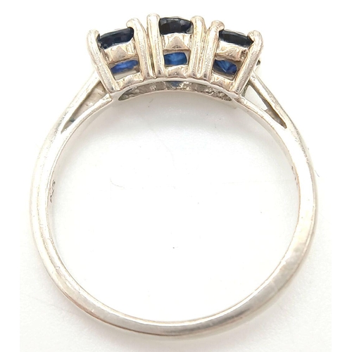 782 - A Sterling Silver Blue Sapphire Set Trilogy Ring Size R. The Ring is set with Three 5mm Oval Cut Blu... 