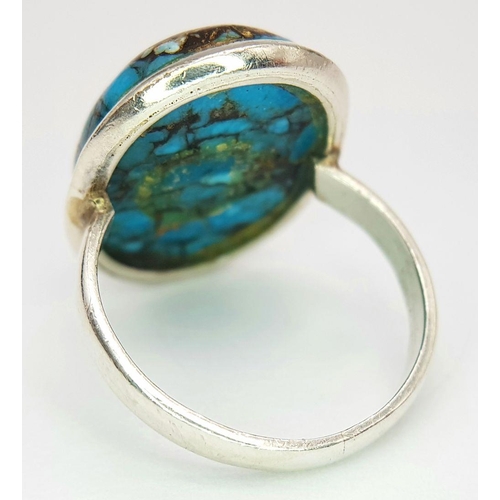 852 - A Vintage Sterling Silver Navajo/Native American Design Turquoise Cabochon Ring Size N. The Ring is ... 