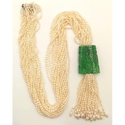 86 - An Eight Row Seed Pearl Necklace with Hanging Jade Pendant. 4cm pendant. 60cm necklace.