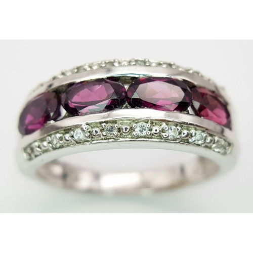 880 - A Sterling Silver Amethyst and White Topaz Set Ring Size R. The Crown Measures 9mm Wide at its wides... 