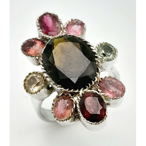 887 - A Vintage Sterling Silver Multi-Gemstone Set Ring Size Q. The ring is set with a centre 1.4cm Long O... 