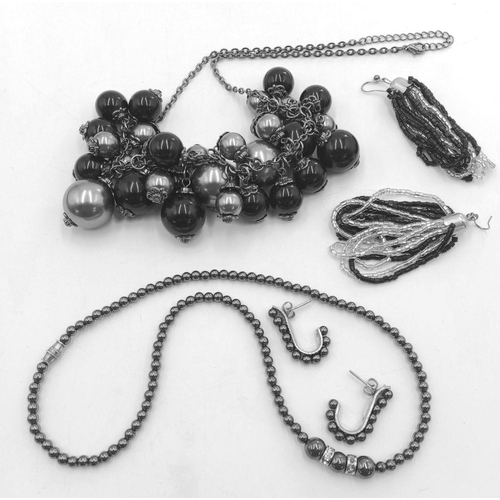 979 - A Beaded Costume Bundle Comprising of 5 Necklaces, 3 Bangles and 2 Pairs of Earrings, 342g total wei... 