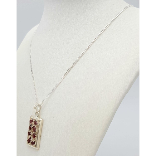 985 - A Modernist Design Sterling Silver and Garnet Set Pendant Necklace, 46cm Length. Pendant Measures 3.... 