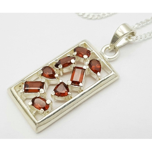 985 - A Modernist Design Sterling Silver and Garnet Set Pendant Necklace, 46cm Length. Pendant Measures 3.... 