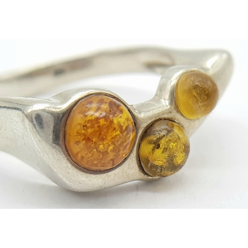 1006 - A Vintage Modernist Design Silver and Amber Set Ring Size R. The Crown Measures 2.2x1cm at its wides... 