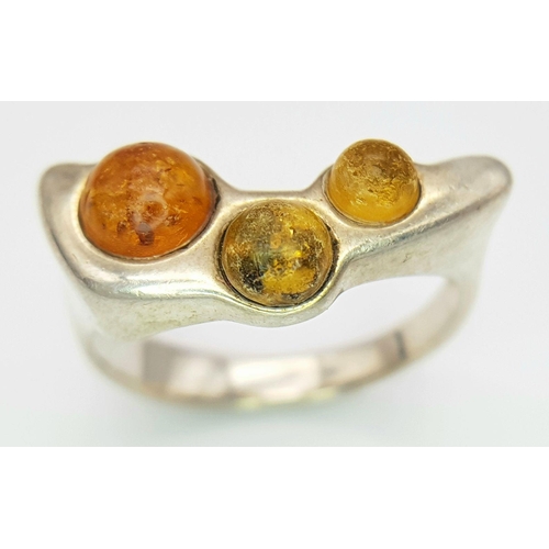 1006 - A Vintage Modernist Design Silver and Amber Set Ring Size R. The Crown Measures 2.2x1cm at its wides... 