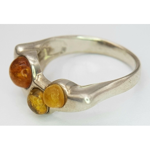 1006 - A Vintage Modernist Design Silver and Amber Set Ring Size R. The Crown Measures 2.2x1cm at its wides... 