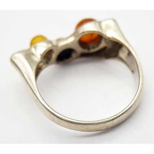 1006 - A Vintage Modernist Design Silver and Amber Set Ring Size R. The Crown Measures 2.2x1cm at its wides... 