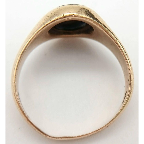 148 - A Vintage 9K Yellow Gold Black Onyx Signet Ring. Full UK hallmarks. Size T 1/2. 5.5g total weight.