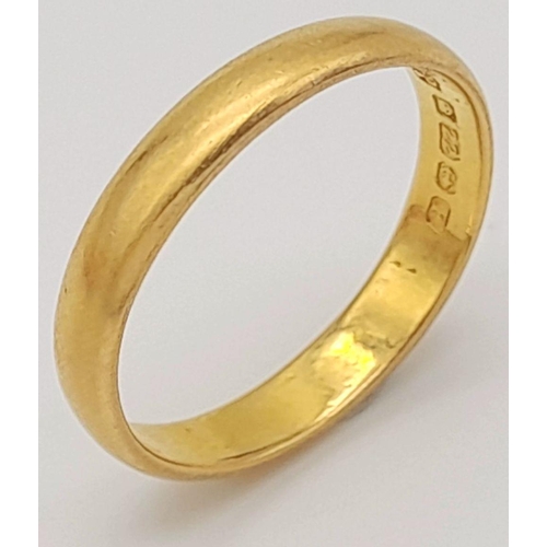 211 - A 22K Yellow Gold Band Ring. Full UK hallmarks. 3mm width. Size O. 3.8g.