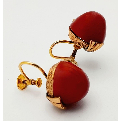 218 - A Pair of Antique 9K Gold and Red Coral Domed Earrings.
Beautifully constructed with screw clasps. 9... 