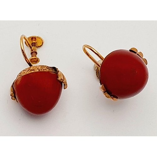 218 - A Pair of Antique 9K Gold and Red Coral Domed Earrings.
Beautifully constructed with screw clasps. 9... 