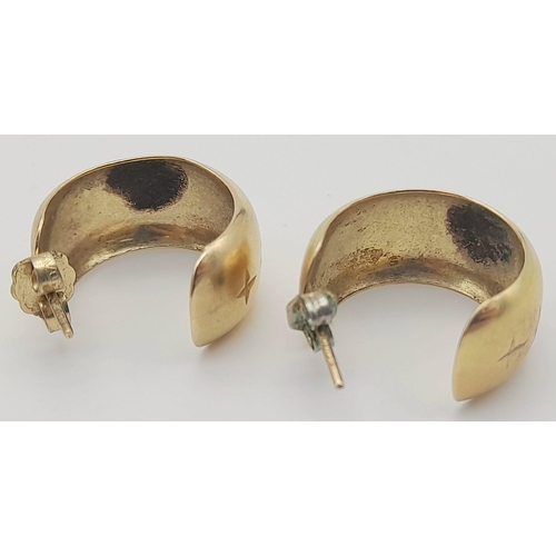 239 - A 9K Yellow Gold Pair of Wide Hoop Earrings. 10mm wide. 3.5g total weight.