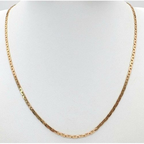 313 - A 9k yellow gold banana link chain, 44.5cm length, 7.2g. Ref: TC02