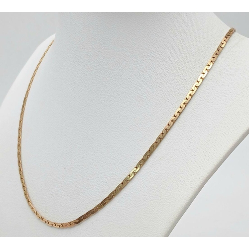 313 - A 9k yellow gold banana link chain, 44.5cm length, 7.2g. Ref: TC02