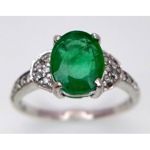 327 - A 9K WHITE GOLD DIAMOND & EMERALD RING 2.22G SIZE N. Ref: A/S 1161