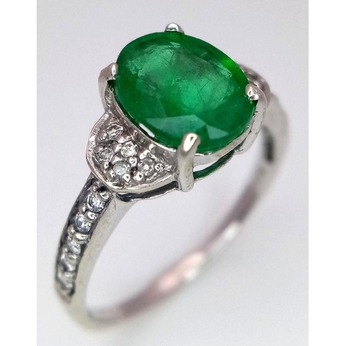 327 - A 9K WHITE GOLD DIAMOND & EMERALD RING 2.22G SIZE N. Ref: A/S 1161