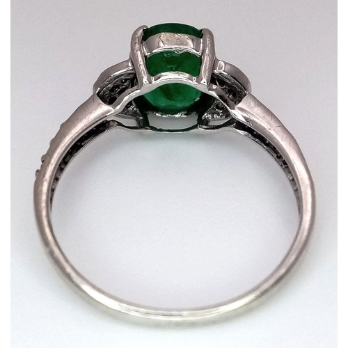 327 - A 9K WHITE GOLD DIAMOND & EMERALD RING 2.22G SIZE N. Ref: A/S 1161