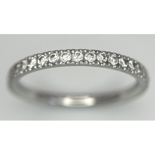 334 - A PLATINUM DIAMOND SET BAND RING 0.30CT 2.64G SIZE J. Ref: A/S 1163