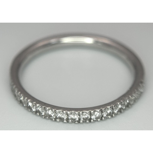 334 - A PLATINUM DIAMOND SET BAND RING 0.30CT 2.64G SIZE J. Ref: A/S 1163