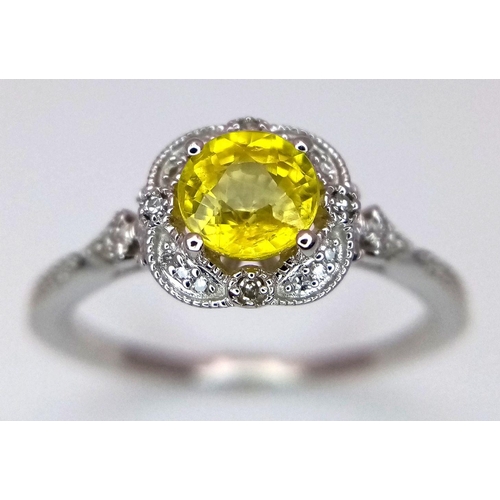 366 - A 9K WHITE GOLD DIAMOND & UNHEATED YELLOW SAPPHIRE RING. APPROX 0.70CT , 2.1G TOTAL WEIGHT , SIZE M.... 