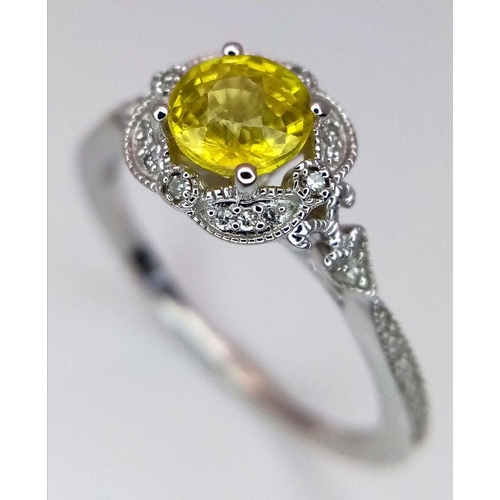 366 - A 9K WHITE GOLD DIAMOND & UNHEATED YELLOW SAPPHIRE RING. APPROX 0.70CT , 2.1G TOTAL WEIGHT , SIZE M.... 