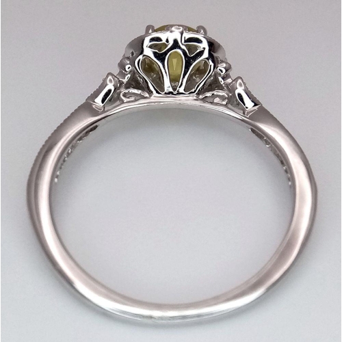 366 - A 9K WHITE GOLD DIAMOND & UNHEATED YELLOW SAPPHIRE RING. APPROX 0.70CT , 2.1G TOTAL WEIGHT , SIZE M.... 