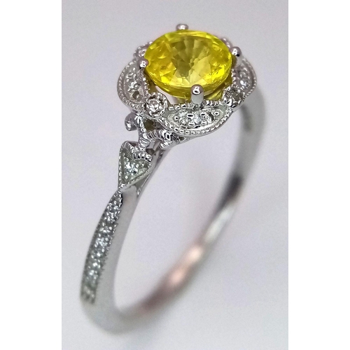 366 - A 9K WHITE GOLD DIAMOND & UNHEATED YELLOW SAPPHIRE RING. APPROX 0.70CT , 2.1G TOTAL WEIGHT , SIZE M.... 