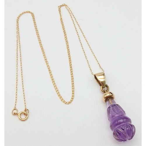 367 - A Vintage 14 Carat Gold Necklace with a Minimum 9 Carat Gold Carved Amethyst Pendant. 41cm Length, P... 