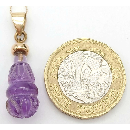 367 - A Vintage 14 Carat Gold Necklace with a Minimum 9 Carat Gold Carved Amethyst Pendant. 41cm Length, P... 