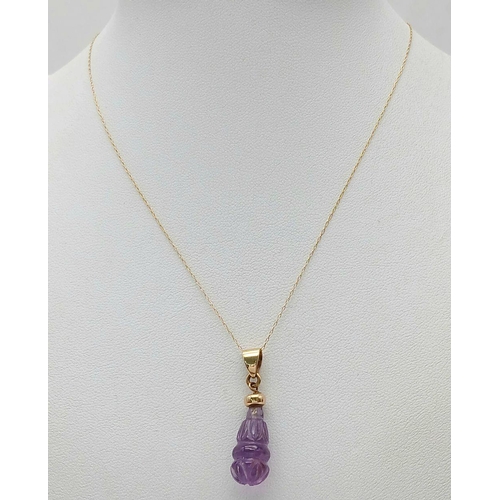 367 - A Vintage 14 Carat Gold Necklace with a Minimum 9 Carat Gold Carved Amethyst Pendant. 41cm Length, P... 