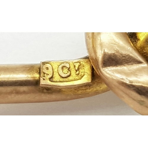 492 - An Antique 9K Love Knot Bar Brooch. Pin has been replaced. 
4cm. 1.84g