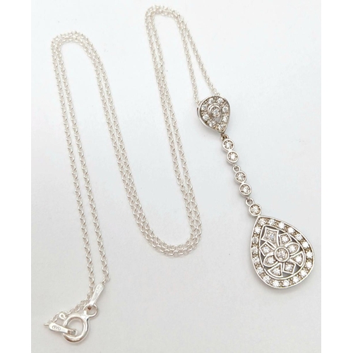 507 - A Stunning Sterling Silver and Diamond Set Pendant Necklace. 46cm Length chain. Pendant length 4.2cm... 