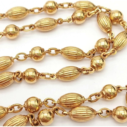 57 - A Delightful 9K Yellow Gold Coffee Bean-Esque and Bauble Link Chain. 50cm length. 17.1g weight.