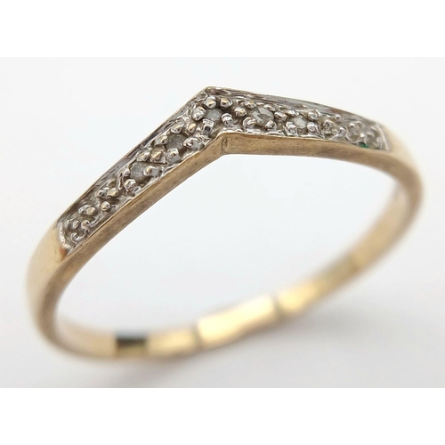 879 - A 9K Yellow Gold Diamond Chevron Ring. Full UK hallmarks. 
Size S 1/2. 1.4g total weight.