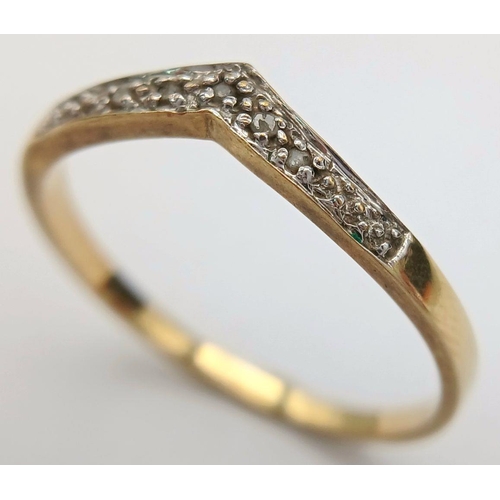 879 - A 9K Yellow Gold Diamond Chevron Ring. Full UK hallmarks. 
Size S 1/2. 1.4g total weight.