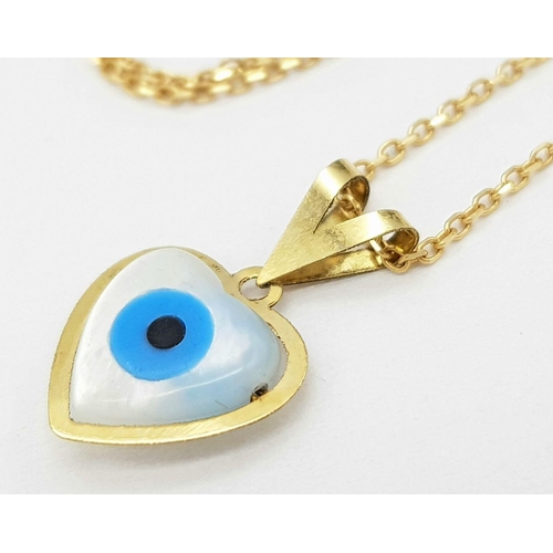 933 - An 18K Gold and Enamel Evil Eye Pendant on an 18K Gold Disappearing Necklace. 15mm pendant. 44cm nec... 