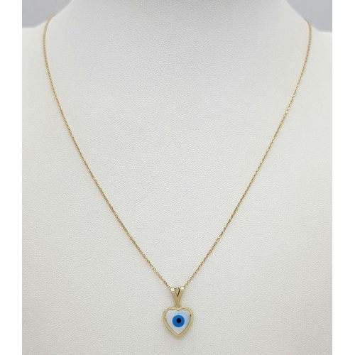 933 - An 18K Gold and Enamel Evil Eye Pendant on an 18K Gold Disappearing Necklace. 15mm pendant. 44cm nec... 