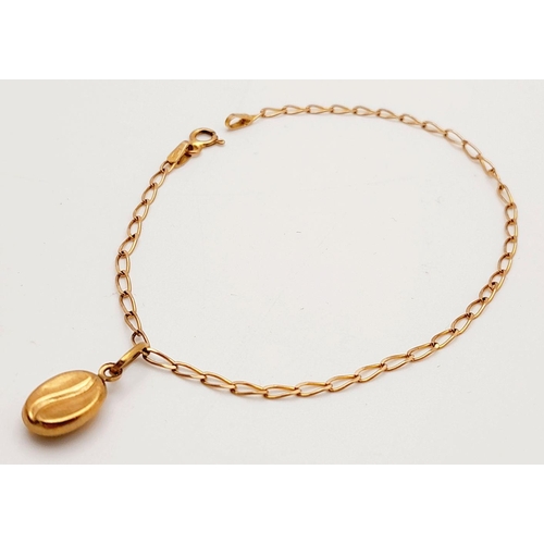 991 - A Delicate 9K Yellow Gold Bracelet with Hanging 9K Gold Coffee Pendant. 18cm length. 1.25g total len... 