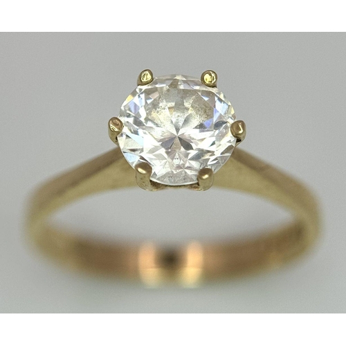 998 - A 9K Yellow Gold White Zircon Ring. Full UK hallmarks. Size O 1/2. 2.7g total weight.