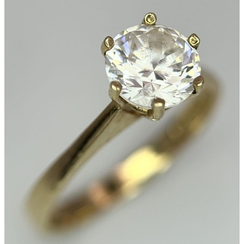 998 - A 9K Yellow Gold White Zircon Ring. Full UK hallmarks. Size O 1/2. 2.7g total weight.