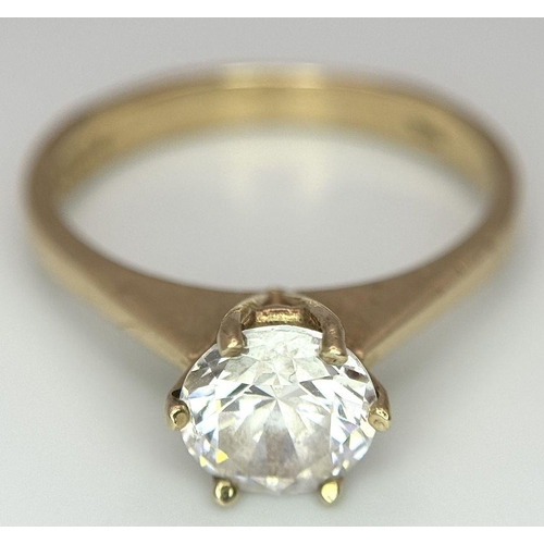 998 - A 9K Yellow Gold White Zircon Ring. Full UK hallmarks. Size O 1/2. 2.7g total weight.