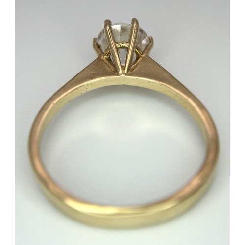 998 - A 9K Yellow Gold White Zircon Ring. Full UK hallmarks. Size O 1/2. 2.7g total weight.