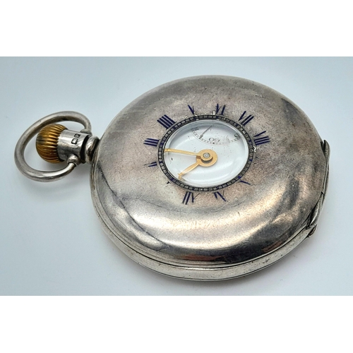 107 - An Antique Sterling Silver Omega Half-Hunter Pocket Watch. Top winder. 52mm diameter. White dial wit... 