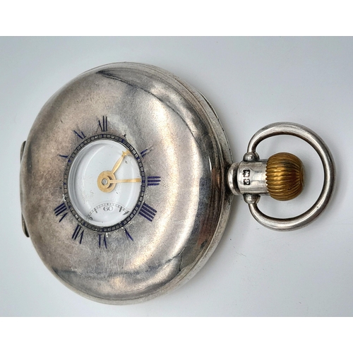 107 - An Antique Sterling Silver Omega Half-Hunter Pocket Watch. Top winder. 52mm diameter. White dial wit... 