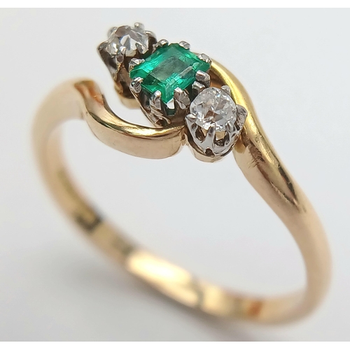 144 - A 18K YELLOW GOLD & PLATINUM DIAMOND & EMERALD 3 STONE TWIST RING. TOTAL WEIGHT 3G. SIZE N. Ref: SC ... 