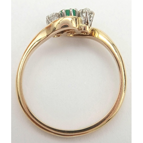 144 - A 18K YELLOW GOLD & PLATINUM DIAMOND & EMERALD 3 STONE TWIST RING. TOTAL WEIGHT 3G. SIZE N. Ref: SC ... 